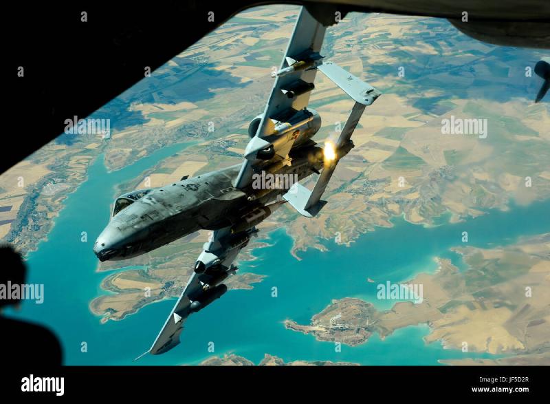 a-us-air-force-a-10-thunderbolt-ii-departs-after-receiving-fuel-from-JF5D2R.jpg